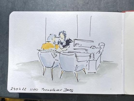 A drawing of a scene where two people sitting vice versa at a table, one giving the other a manicure.