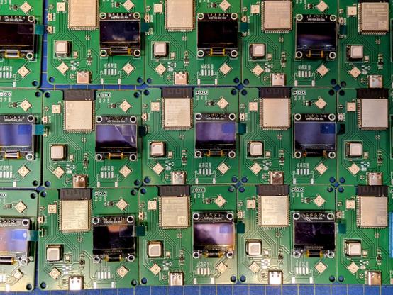 Slightly closer shot of the pcbs now with a small oled display soldered on each one.