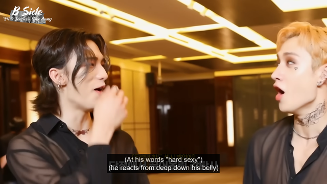 Hyunjin and Bang Chan make shocked faces at each other. Caption: (At his words "hard sexy") (he reacts from deep down his belly)