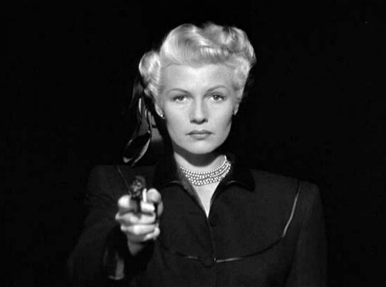 Rita Hayworth mit dem Finger am Auslöser...
