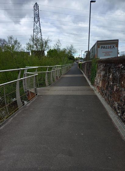 Side extension to a bridge to accommodate a shared cycle and foot path