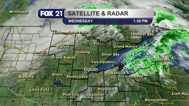 The satellite and radar over the Northland at 1:30 p.m. on April 23, 2025, shows light rain showers over parts of the Upper Peninsula, moving to the northeast.  Cloud cover persist over the Rain River Basin, with scattered clouds over northwest Wisconsin.  The rest of the region is seeing mostly clear skies.