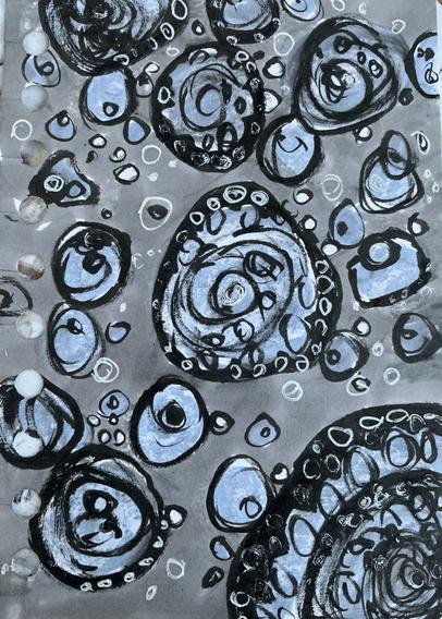 Black, while, grey, pale blue circles and spirals of different sizes, random, organic, varied