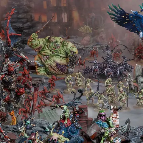 A dynamic scene showcases a variety of Warhammer miniatures representing the forces of Chaos. Prominently featured is a large, green-skinned figure, the Lord of Poxes, wielding a weapon and surrounded by smaller, grotesque Nurgle-themed models. In the foreground, red-armored Khorne warriors and other chaotic entities are depicted, set against a backdrop of ruined structures and a smoky atmosphere, emphasizing the dark and chaotic nature of the 41st millennium.