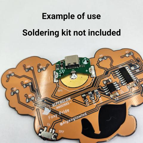 A 5V Coin Cell Be Gone soldered to the back of a copper-colored board with an SMT coin cell holder footprint.