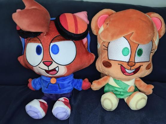 Plushies of Murphy the Cat and Mitzi the Squirrel from AJMarekArt's Murphy and Mitzi series.