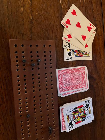 Cribbage hand of 555Q with K as a starter.