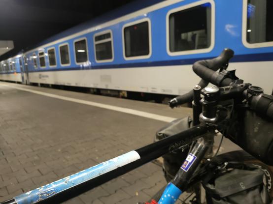 Bike with the classic train cars in blue and white colour (the ČD scheme).