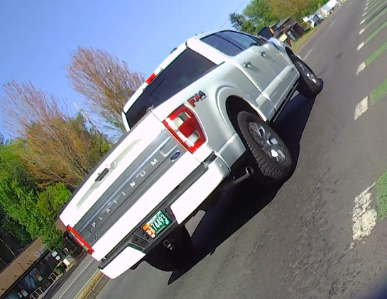 OR SB 74493 white ford crew cab pickup, rear plate