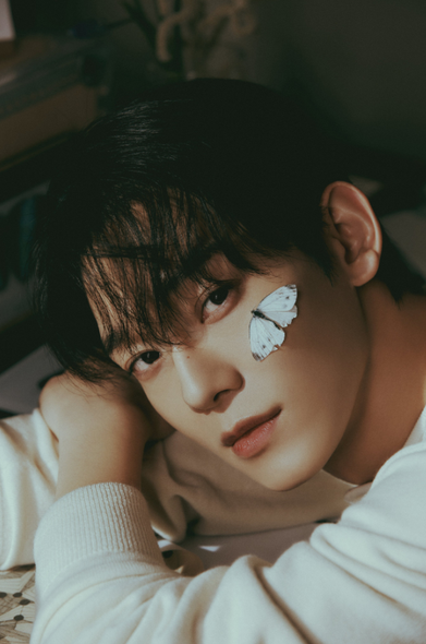 Promo image for Chen's new single. He's got a butterfly on his cheek!