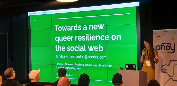 Aendra speaking at Ahoy.eu about queer resilienace at the opensocialweb