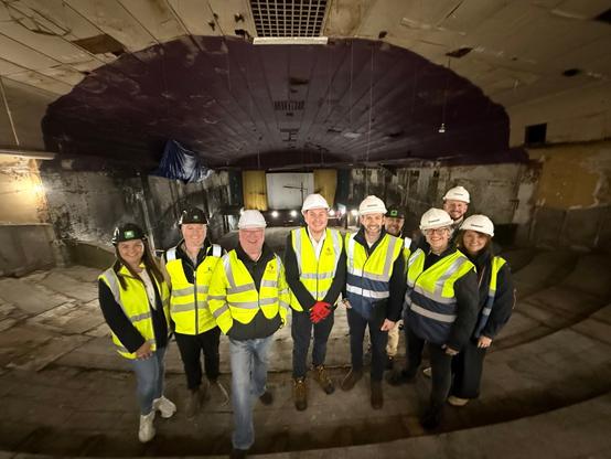 Representatives from Swansea Council, Beacon Cymru and Easyliving Ltd at the former Castle Cinema