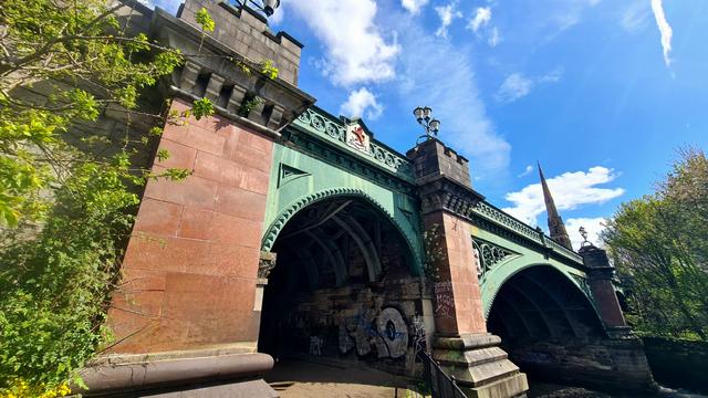 A Victorian cast-iron and stone bridge over the River Kelvin in Glasgow.
