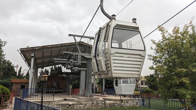 Cable car gondolas hanging in a closed cable car.