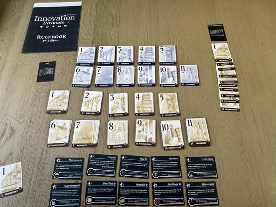 Innovation Ultimate setup with Sands of Time expansion. All cards laid out on rows. Taking up a lot of table space