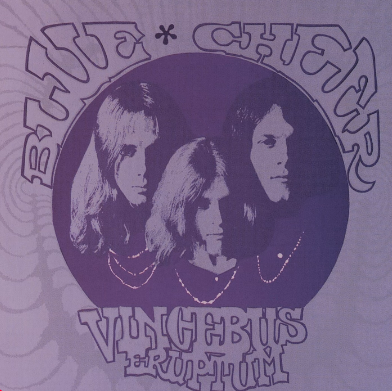 The cover of Blue Cheer's 1968 record 'Vincebus Eruptum'. It's a light purple kind of psychedelic look, with the band's logo around a group photo, all in a purple tint.