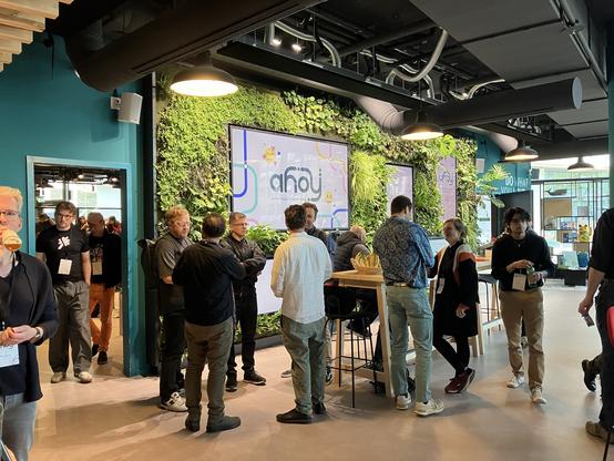 A lot of people talking in the conference venue's break room