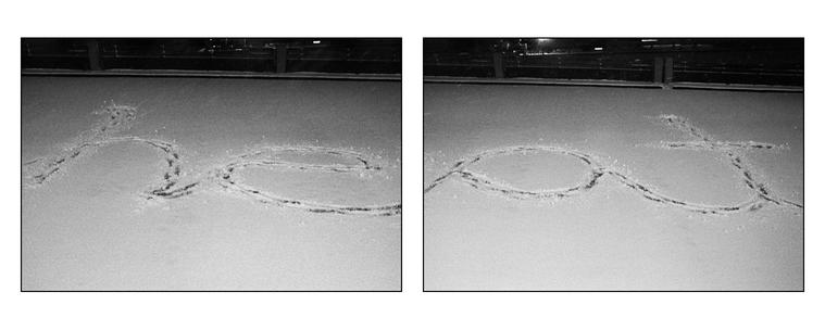 "heat" spelled out by walking in snow