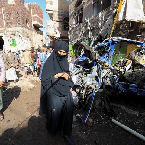 People on Monday gathered at the site of a strike in the Farwah neighborhood in Sana, Yemen.