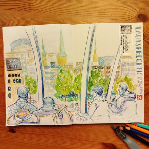 Doppelseite im Skizzenbuch mit vier Sketchern, die vor einer verglasten Front zeichnen. Draußen die Stadtansicht und Regentropfen.