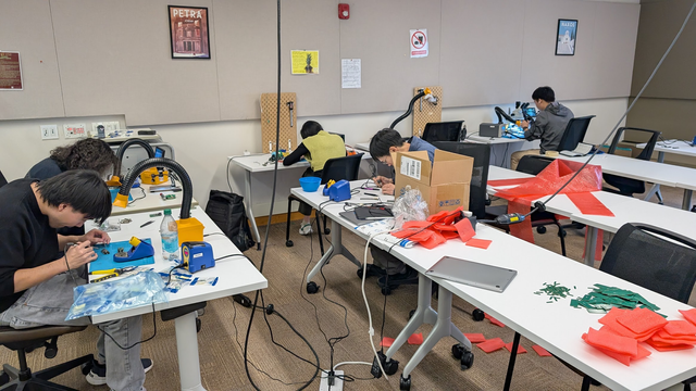 Pedro, Yudai, Jasmine, Shan-Yuan and Romain soldering 20 boards in record time.