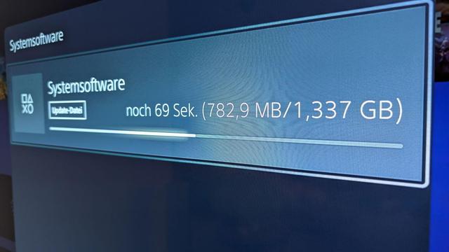 System software download progress dialog on a PlayStation 5 with a total of 1337GB.
