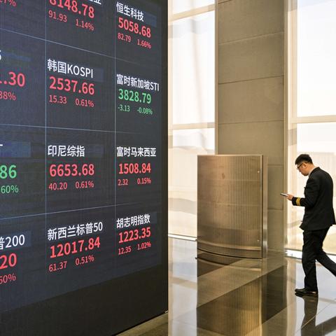 The Shanghai Stock Exchange building on Friday. Reports that China may ease tariffs on some U.S. imports lifted stock markets.