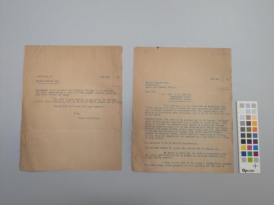 Two pieces of beige brown paper with blue ink. No creased and broken off  pieces.