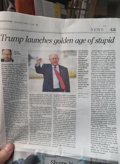Toronto Star article.
The picture is a photo of Donald Trump pumping his fist.
The headline reads: "Trump launches golden age of stupid."