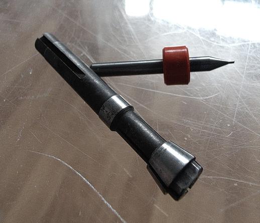 Mystery collet next to a broken 3mm endmill.