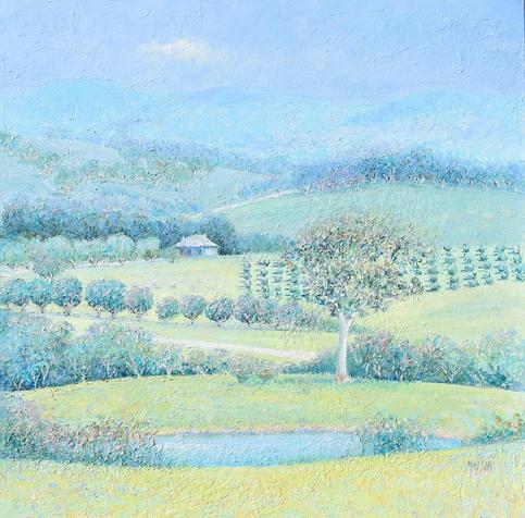 A thickly textured painting of  an Australian  country scene with gently rolling blue hills, farmhouse, vineyards, lake and grazing sheep.