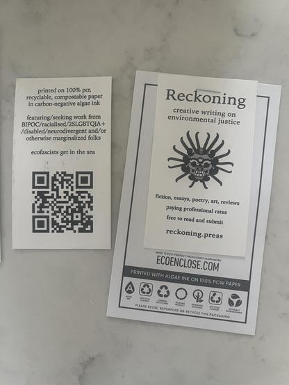 Our new 100% pcr, algae ink, recyclable, compostable promo cards featuring our Moníca Robles Corzo skull guy. “Reckoning: creative writing on environmental justice. Fiction, essays, poetry, art, reviews, paying professional rates, free to read and submit. Reckoning.press. And on the reverse it says “featuring/seeking work from BIPOC/racialised/2SLGBTQIA+/disabled/neurodivergent and/or otherwise marginalized folks - ecofascists get in the sea” and a QR code.