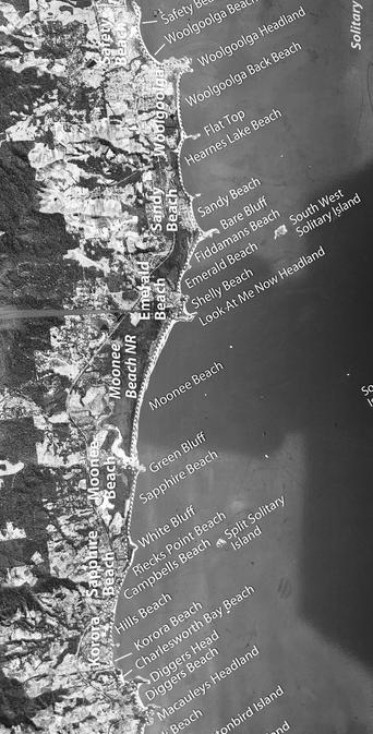 The coastal sprawl of suburbia into the surrounding countryside, NSW, Emerald beach sign