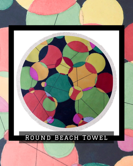 random circles in various colors overlap and crowd one another for space. On a round beach towel.