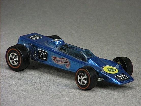 Released in 1969, Spectraflame Blue Lotus Turbine of 1969 Grand Prix with Redline wheels. Notes: Some models have detachable fuel tanks. Packaging: Grand Prix. Metal Body, Metal Base. Made in Hong Kong. Scarcity: 3/10