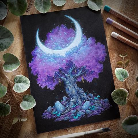 A photo of a portrait-format painting on black paper, placed on a wooden table and surrounded by coloured pencils, a paint brush, and leaves for decoration. The painting features a maple tree with soft, warm purple foliage, a white, glowing sickle moon stuck in its crown. At its base, rune stones showing moon phases are scattered among purple grass and rounded teal green leaves. A few golden charms hang from the tree’s branches.