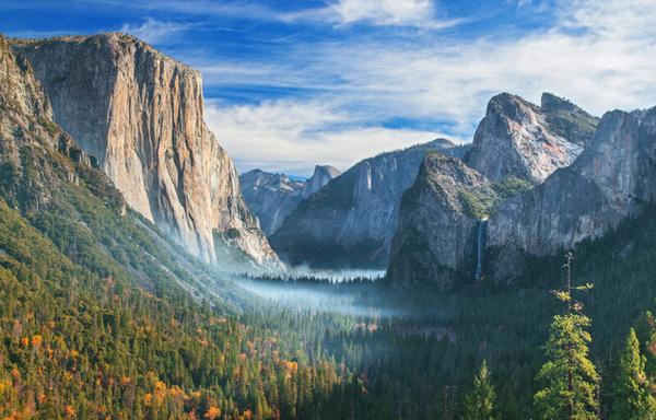 Photo of the famous “Tunnel View“ at Yosemite National Park. A scenic landscape vista.