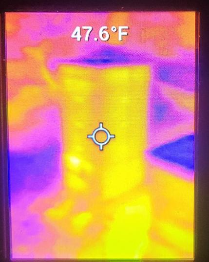 Image on a screen showing a yellow and orange glowing box, purple and dark blue colors away from the box indicating cold