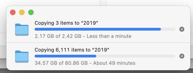 a screen grab from the Mac Finder, showing 2 process bars for copying some backups from a stored drive