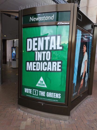 The Greens political ad. It reads: Dental into Medicare. Vote 1 The Greens.