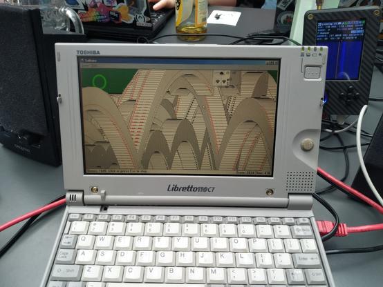 the old Microsoft solitaire victory screen on Windows 98 on a Toshiba Libretto110CT laptop