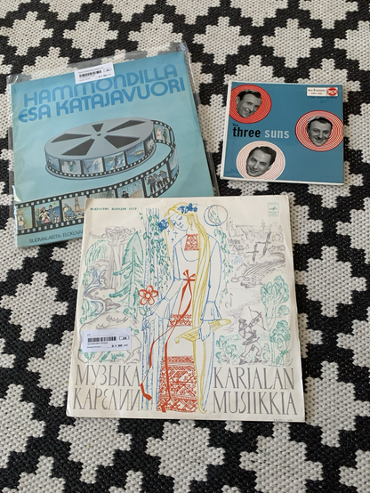 Three vinyl records: The Three Suns, Esa Katajavuori, Karjalan musiikkia