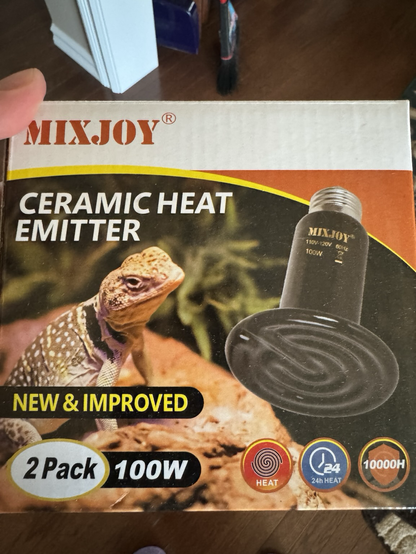Picture of a ceramic heat emitter with some kind of delightful lizard shown