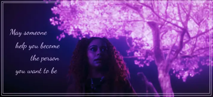 Crystal beneath a glowing tree with text that reads "May someone help you become the person you want to be"