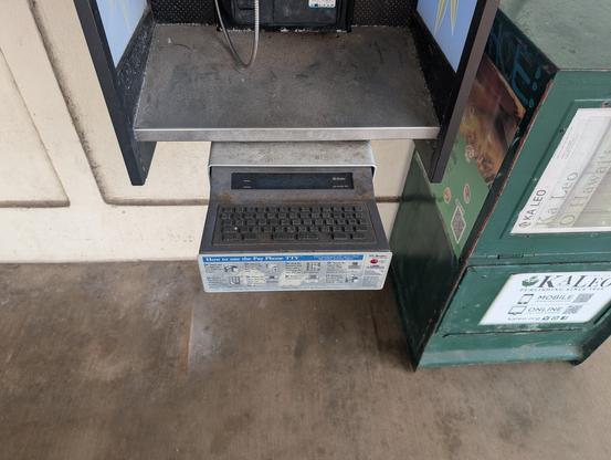 A Hawaiian Telcom payphone at U Hawaii with a beautifully preserved tty screen and keyboard.