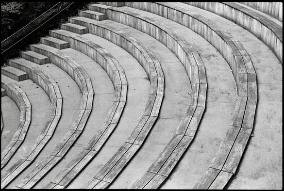 Black and white film photo. Part of  empty amphitheater.