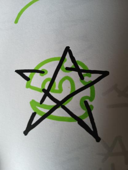 Green alien wyrm symbol intertwined with a black pentagram