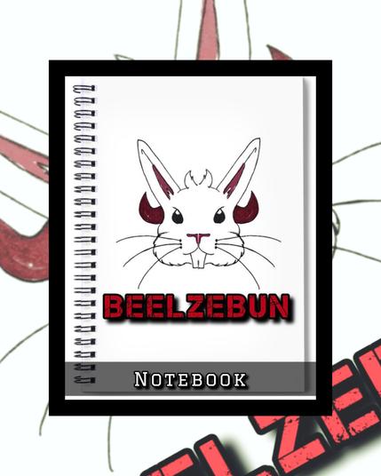 A devilishly adorable bunny. On a notebook.