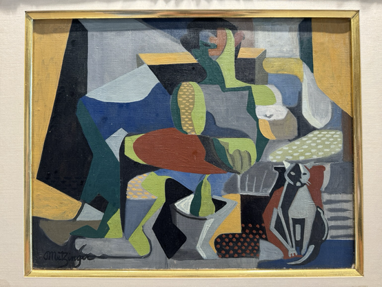 photo of artwork in in gold lined white mat on display at museum - Jean Metzinger “Seated Man with Cat” oil painting in landscape orientation, colorful Cubist composition, cat in lower right
