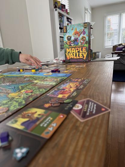 A photograph or Maple Valley, Creature Comforts the board game